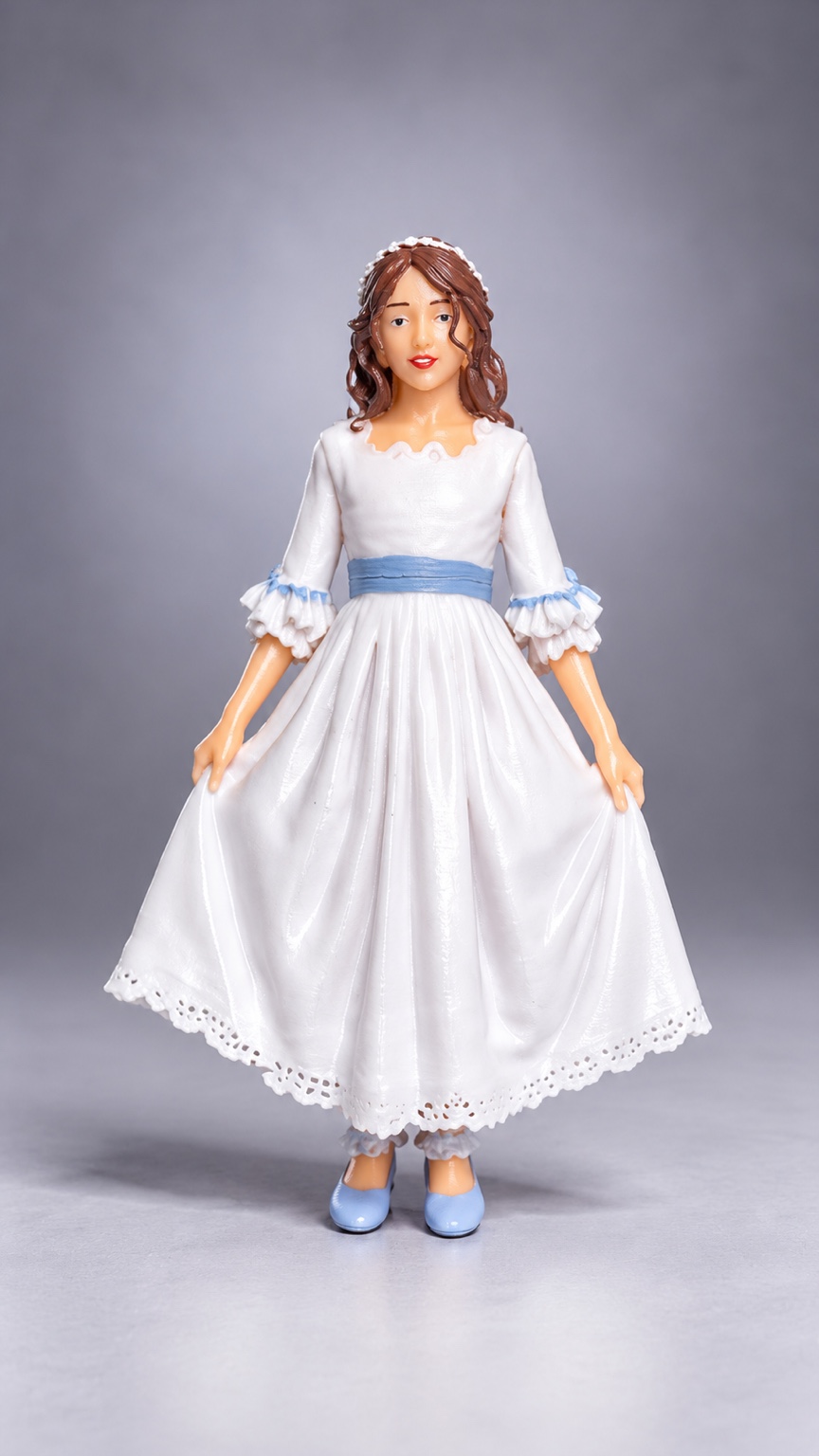 Figura de comunión con vestido blanco y detalles azules